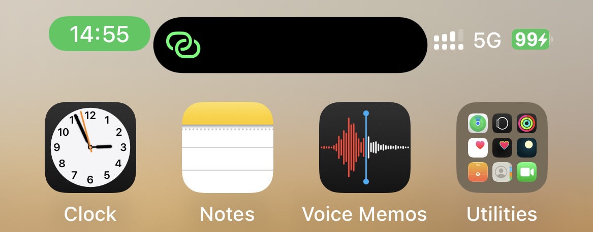 iPhone 13 Pro screenshot showing a long Dynamic Island pill with status indicators close to its edges